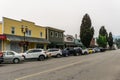 AGASSIZ, CANADA - August 18, 2018: main street in small town in British Columbia with shops restaurants cars.