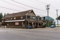 AGASSIZ, CANADA - August 18, 2018: main street in small town in British Columbia with shops restaurants cars.