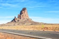 Agathla peak with the road to Monument Valley in the foreground, Arizona, United States Royalty Free Stock Photo