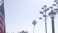 Agave cactus flower, wild west lantern and american flag, western California USA Royalty Free Stock Photo