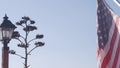 Agave cactus flower, wild west lantern and american flag, western California USA Royalty Free Stock Photo