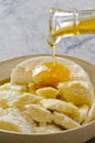 Agave Syrup pouring on Cottage Cheese Royalty Free Stock Photo