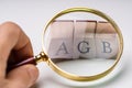 AGB Letters Under Magnifying Glass Royalty Free Stock Photo