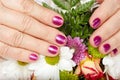 Age manicure for senior woman. Hands with pink nails. Royalty Free Stock Photo