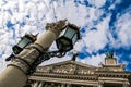 Age-old Iron Street Light on Large Post by Opera House Royalty Free Stock Photo