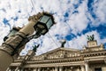 Age-old Iron Street Light on Large Post by Opera House Royalty Free Stock Photo