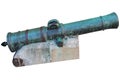 Age-old ship cannon on a white Royalty Free Stock Photo