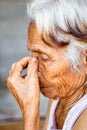 Close up of senior asian woman face and eye, Asian senior woman with sinusitis sinusitis Royalty Free Stock Photo