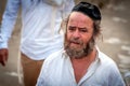 Aged, beggar hasid pilgrim on the city street. Uman, Ukraine - 21 September 2017: holiday Rosh Hashanah, Jewish New Year