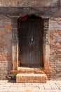 Aged brick building door outside Royalty Free Stock Photo