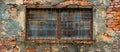Aged Brick Wall With Barred Window Royalty Free Stock Photo