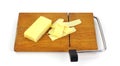 Aged Cheddar Cheese, Slices, Cutting Board Royalty Free Stock Photo