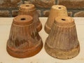 Aged clay pots upside down closeup view