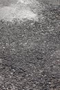 Aged coarse asphaltic road surface texture Royalty Free Stock Photo