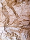 Aged crumpled yellow paper surface