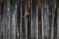 Aged dark weathered wood siding building background Royalty Free Stock Photo