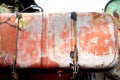 Aged fuel tank of old combine-harvester