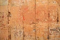 Aged grunge wooden pink orange painted door Royalty Free Stock Photo