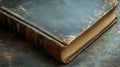 Aged Leather Bound Book Resting on Dark Surface Royalty Free Stock Photo