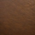 572 Aged Leather Texture: A vintage and aged background featuring an aged leather texture in warm and distressed tones that evok Royalty Free Stock Photo