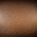 572 Aged Leather Texture: A vintage and aged background featuring an aged leather texture in warm and distressed tones that evok Royalty Free Stock Photo