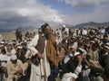 The aged man standing During a grand Jirga .