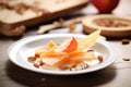 aged manchego slices with quince paste and almonds