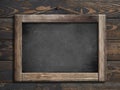 Aged menu blackboard hanging on wooden wall 3d illustration Royalty Free Stock Photo