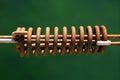 Aged mooring rusted spring on green water Royalty Free Stock Photo