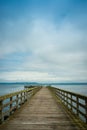 Aged and Mossy Wooden Pier on Vashon Island Royalty Free Stock Photo