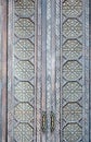 Aged ornate doors with door knob