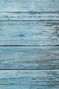 Aged painted cracked boards with blue color peeling paint. Old natural grunge textured wooden texture. Weathered wood wall for Royalty Free Stock Photo