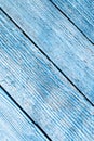 Aged painted cracked boards with blue color peeling paint. Old natural grunge textured wooden texture. Weathered wood wall for Royalty Free Stock Photo