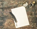 Aged paper and antique writing accessories. Vintage style Royalty Free Stock Photo