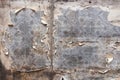 Aged room wall background with torn vintage wallpaper. Royalty Free Stock Photo