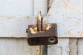 Aged rusted metall gate closed steel old padlock safety