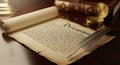 Ancient scroll unfurled with old books suggesting history knowledge and wisdom Royalty Free Stock Photo