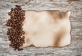 Aged sheet of paper with coffee beans