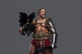 Aged but still mighty muscular gladiator with long grey hair and beard