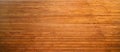 Aged striped deep brown plank wooden textured background