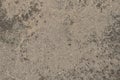 Weathered textured gray surface of the artificial stone