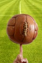 Aged vintage retro football leather ball Royalty Free Stock Photo