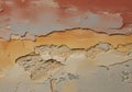 Aged wall texture with multiple layers of peeling paint and cracks Royalty Free Stock Photo