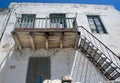 A weathered old wooden balcony, at a village house on the Greek island of Anti Paros. Royalty Free Stock Photo