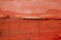 Aged weathered wood painted in red orange color Royalty Free Stock Photo