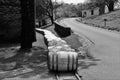 Aged whiskey, scotch, bourbon barrels in Kentucky ready for transportation in black and white