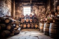 aged whiskey barrels stacked in a rustic warehouse Royalty Free Stock Photo