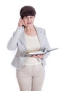 Aged woman posing like an office worker, administrator, secretary. Portrait against of white background Royalty Free Stock Photo