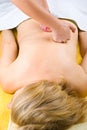 Aged woman relaxing at spa massage Royalty Free Stock Photo