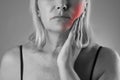 Aged woman with toothache, teeth pain closeup